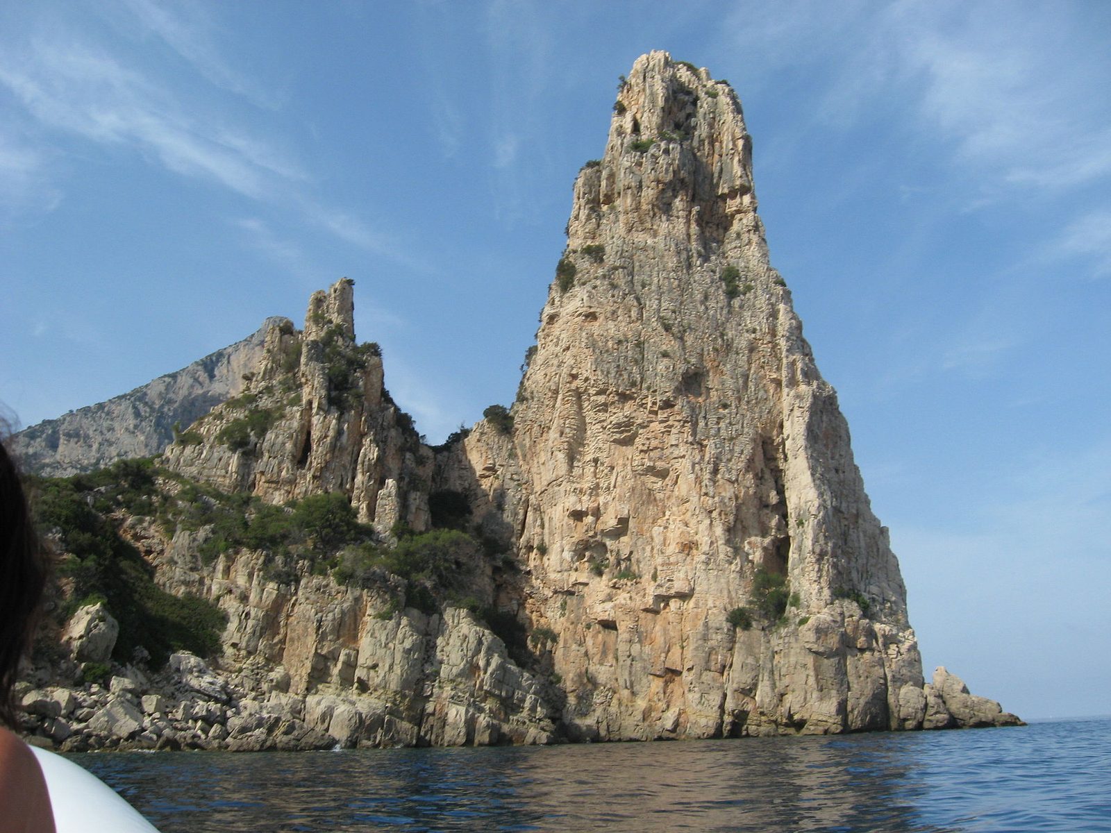 The Pedra Longa monolith rising from the sea